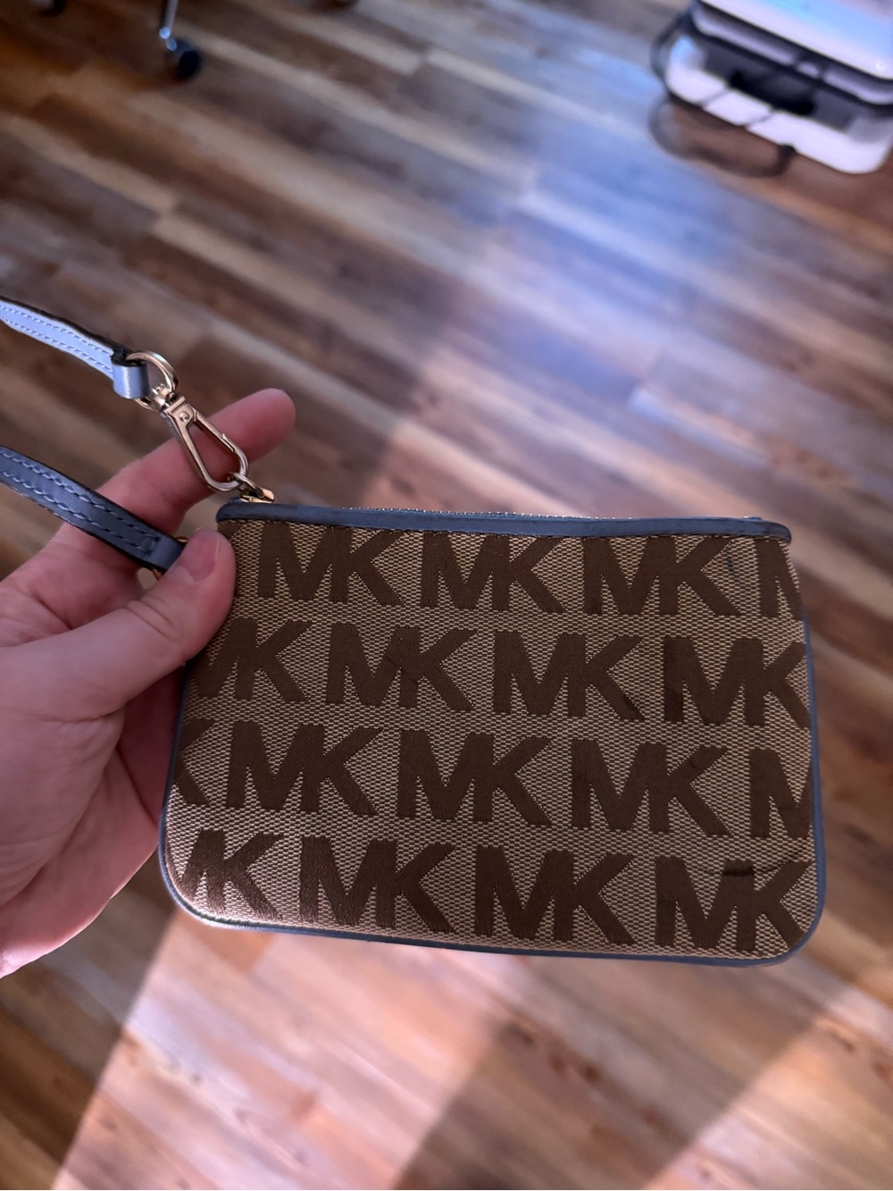 Michael Kors Brown MK Monogram Wristlet with light blue Trim